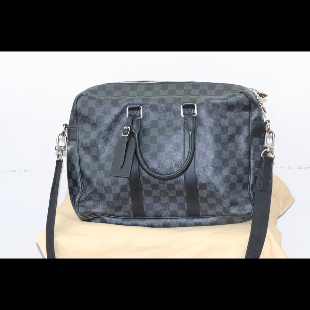 Black Damier Graphite Louis Vuitton Voyage GM bag.